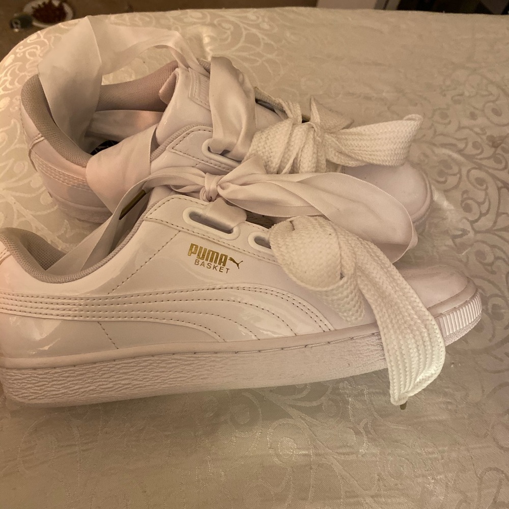 Puma white bow tied laces